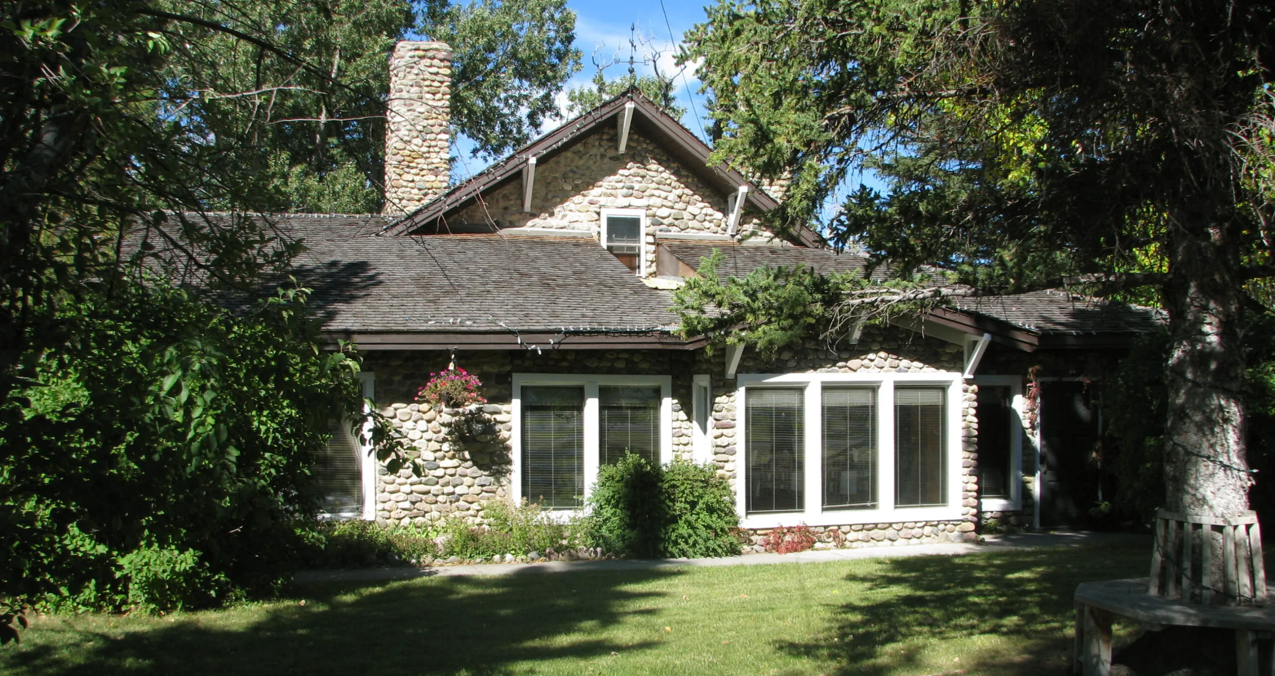 Stone chimney and sunroom of the manor